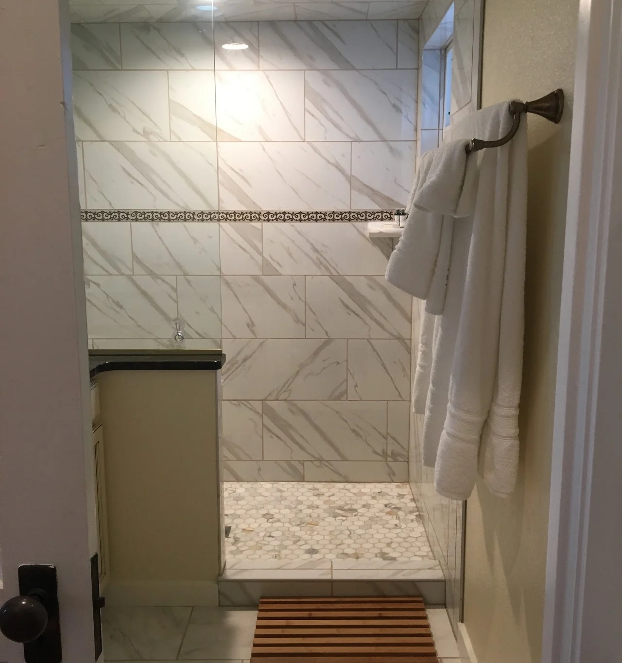 Shower with marble-look tile